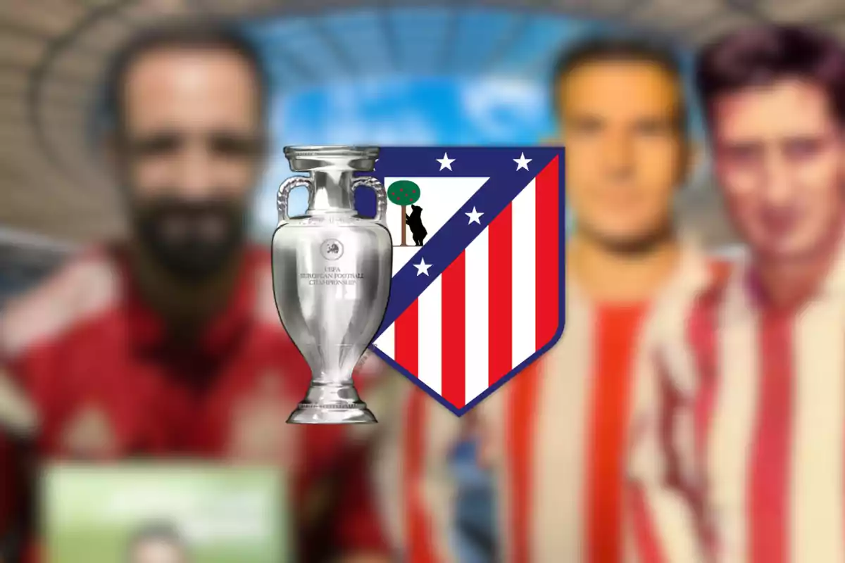 Imagen que muestra el escudo del Atlético de Madrid y la copa de la UEFA European Football Championship, con tres personas desenfocadas en el fondo.